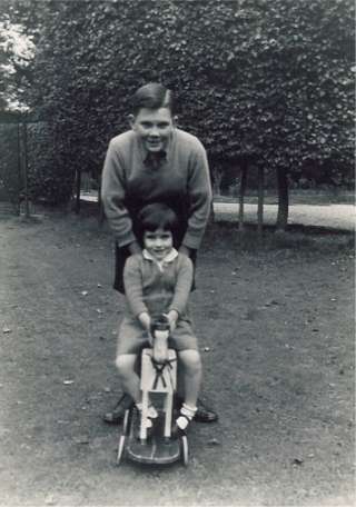 Ann on Bobby Horse with her older brother Malcolm