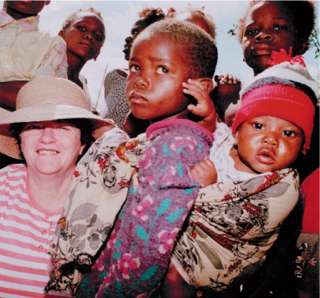 Ann visiting a school project in Zambia she was supporting