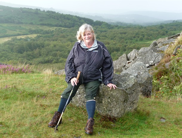 Ann walking on Dartmoor where she now lives